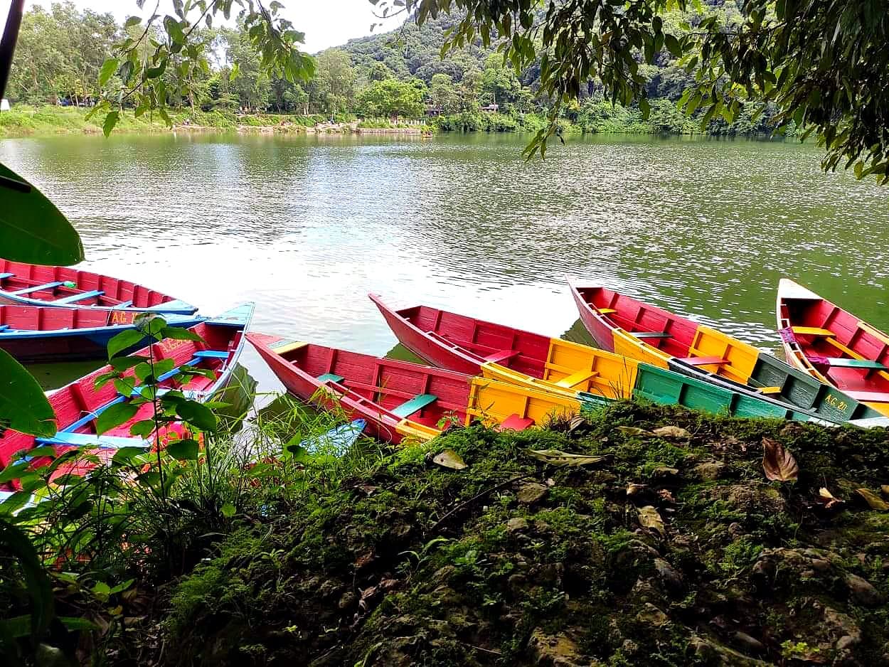 Rowing boats on the shore of Begnas Lake